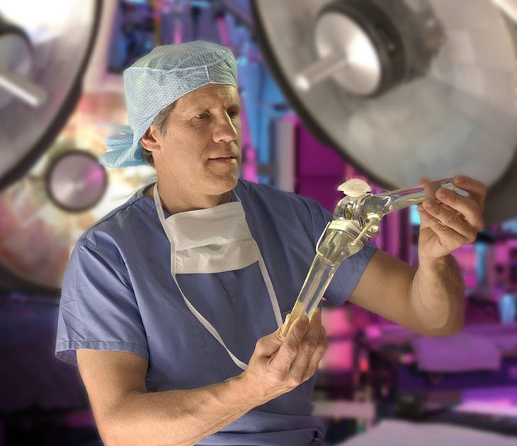 Dr. Lionberger observing implant model